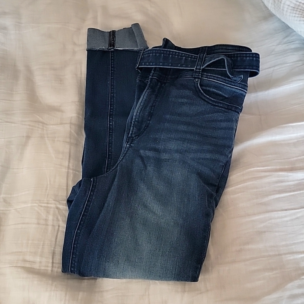 High rise belted skinny jeans